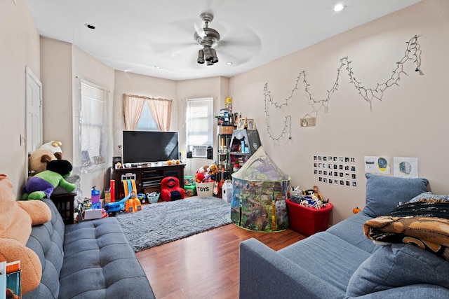 4512 S Fairfield Ave, Chicago, IL 60632 - living room with wood finished floors, ceiling fan, and recessed lighting