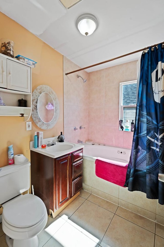 4512 S Fairfield Ave, Chicago, IL 60632 - bathroom with tiled shower / bath combo, tile patterned flooring, toilet, and vanity