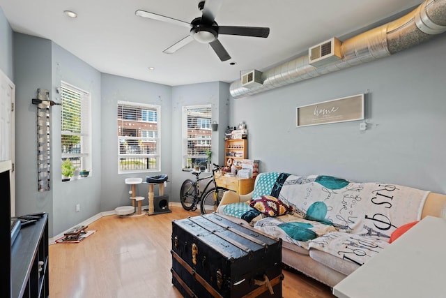 4512 S Fairfield Ave, Chicago, IL 60632 - living room featuring a ceiling fan, wood finished floors, recessed lighting, and baseboards