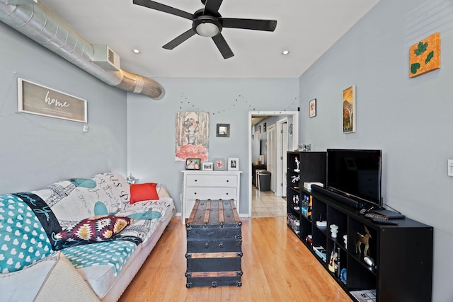 4512 S Fairfield Ave, Chicago, IL 60632 - living room with a ceiling fan, wood finished floors, and recessed lighting
