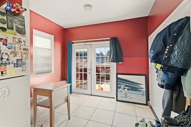 4512 S Fairfield Ave, Chicago, IL 60632 - doorway featuring french doors and tile patterned flooring