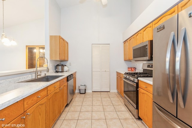 736 N Gary Ave Unit 208, Carol Stream, IL 60188 - kitchen with appliances with stainless steel finishes, a sink, high vaulted ceiling, a chandelier, and light tile patterned floors