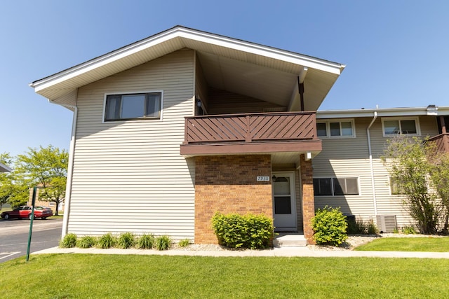 7930 164th Ct Unit 253, Tinley Park, IL 60477 - view of building exterior featuring central AC