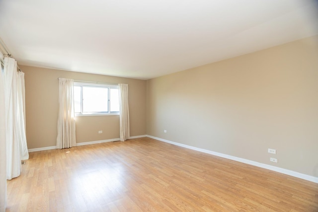 7930 164th Ct Unit 253, Tinley Park, IL 60477 - unfurnished room featuring light wood-type flooring and baseboards