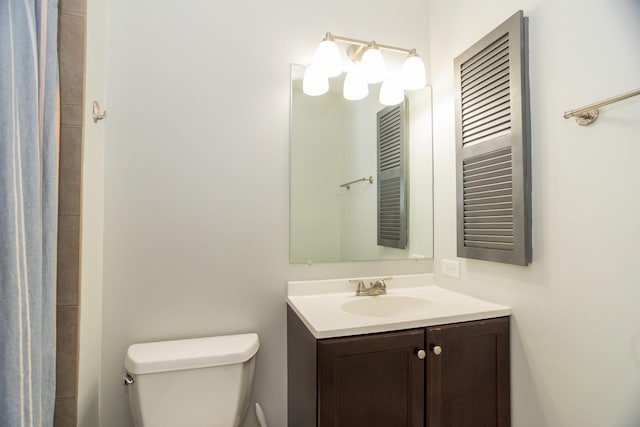 7930 164th Ct Unit 253, Tinley Park, IL 60477 - bathroom with toilet, vanity, and curtained shower