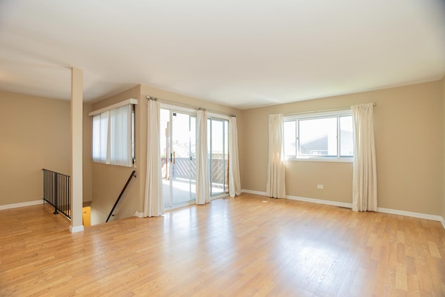 7930 164th Ct Unit 253, Tinley Park, IL 60477 - empty room featuring light wood finished floors and baseboards