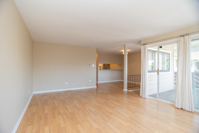 7930 164th Ct Unit 253, Tinley Park, IL 60477 - unfurnished room with light wood-type flooring and baseboards