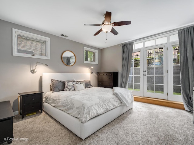 1043 W Wolfram St Unit 1, Chicago, IL 60657 - bedroom with access to exterior, french doors, a ceiling fan, and carpet flooring