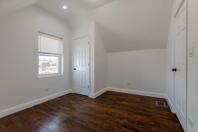 10017 S Indiana Ave, Chicago, IL 60628 - bonus room featuring vaulted ceiling, dark wood-type flooring, and recessed lighting