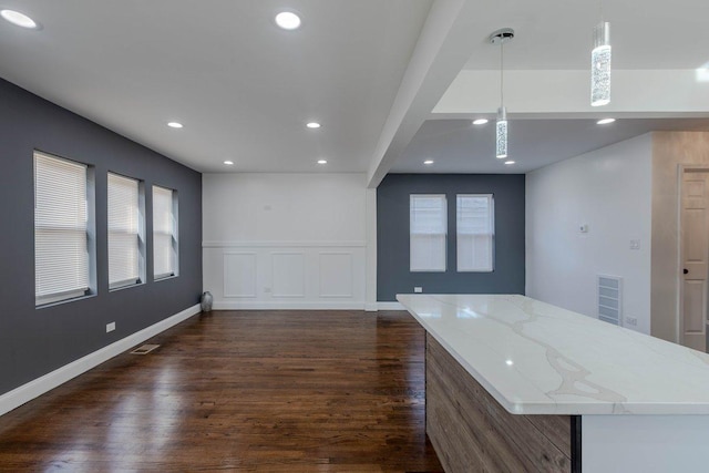 10017 S Indiana Ave, Chicago, IL 60628 - unfurnished living room featuring dark wood-style flooring, recessed lighting, and healthy amount of natural light