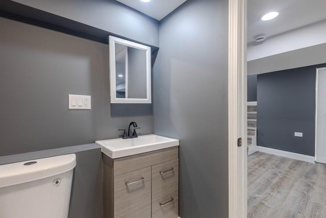 10017 S Indiana Ave, Chicago, IL 60628 - half bathroom with vanity and wood finished floors