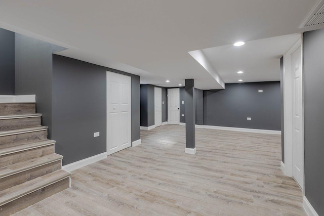 10017 S Indiana Ave, Chicago, IL 60628 - finished below grade area featuring light wood finished floors, stairway, and recessed lighting