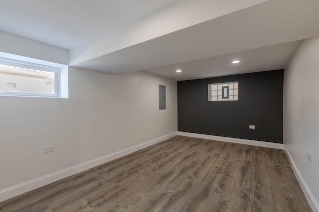 10017 S Indiana Ave, Chicago, IL 60628 - below grade area featuring electric panel, wood finished floors, and recessed lighting