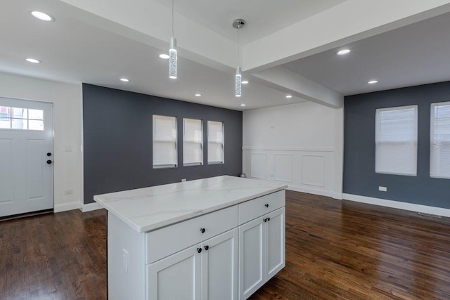 10017 S Indiana Ave, Chicago, IL 60628 - kitchen with light stone countertops, white cabinets, pendant lighting, dark wood-style flooring, and recessed lighting