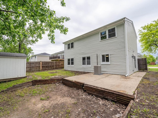 930 W Bryn Mawr Ave, Roselle, IL 60172 - back of house featuring central AC unit and a patio area