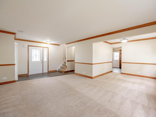 930 W Bryn Mawr Ave, Roselle, IL 60172 - empty room featuring crown molding, baseboards, stairway, and carpet floors