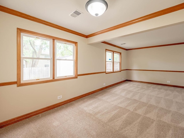 930 W Bryn Mawr Ave, Roselle, IL 60172 - spare room featuring light colored carpet, baseboards, and crown molding