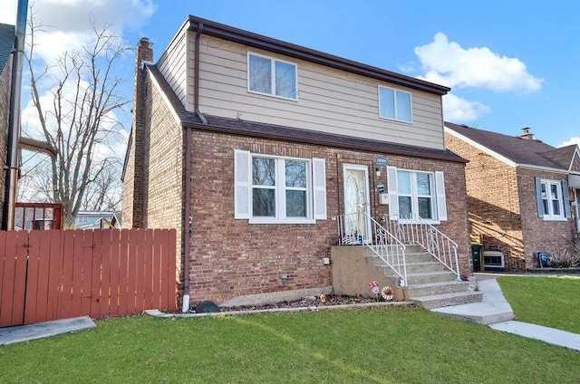 18006 Oakwood Ave, Lansing, IL 60438 - view of front facade featuring brick siding and a chimney