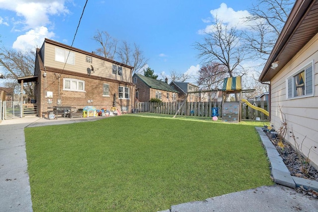 18006 Oakwood Ave, Lansing, IL 60438 - view of yard with a playground, a patio area, and a residential view
