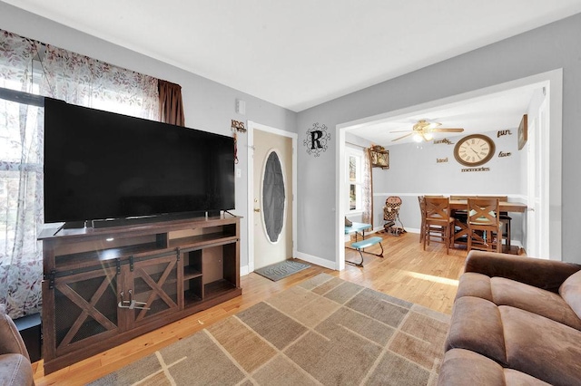 18006 Oakwood Ave, Lansing, IL 60438 - living room with wood finished floors, healthy amount of natural light, and ceiling fan