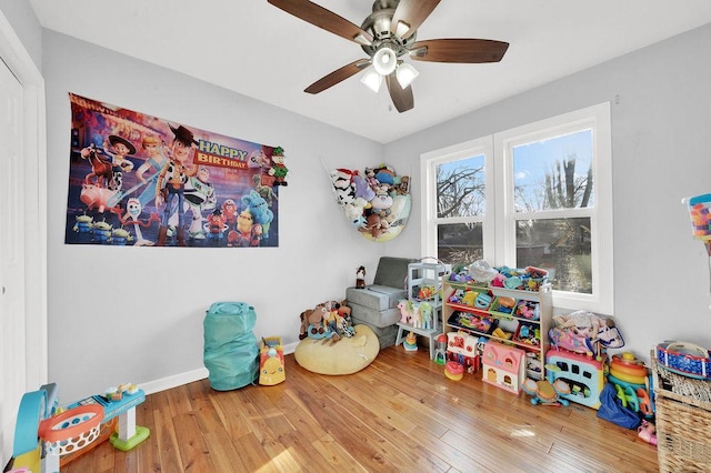18006 Oakwood Ave, Lansing, IL 60438 - playroom with hardwood / wood-style flooring, ceiling fan, and baseboards