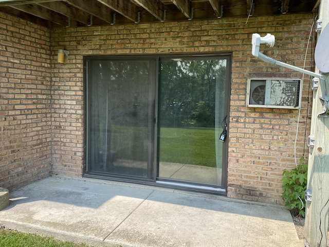 7413 Brookdale Dr Unit 103, Darien, IL 60561 - view of exterior entry with brick siding