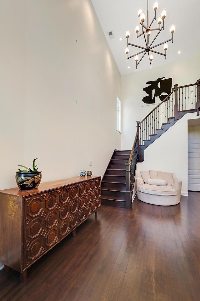 5843 N Oconto Ave, Chicago, IL 60631 - stairway with wood finished floors and a chandelier