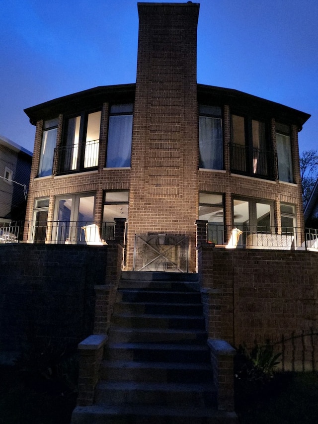 5843 N Oconto Ave, Chicago, IL 60631 - view of front of property featuring stairs and a chimney