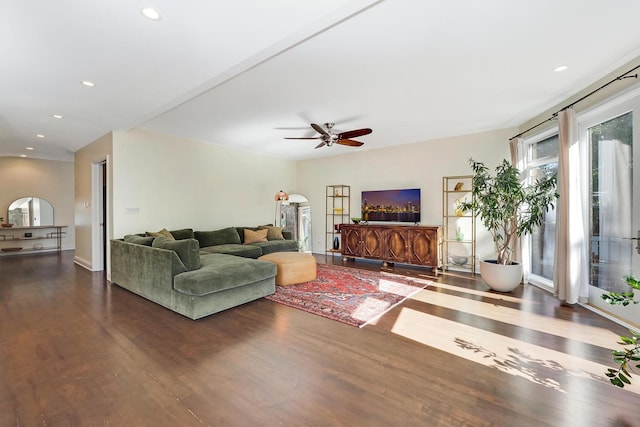 5843 N Oconto Ave, Chicago, IL 60631 - living area with wood finished floors, arched walkways, ceiling fan, and recessed lighting