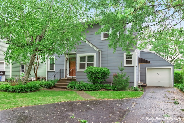 2618 Kashmiri Ave, Mchenry, IL 60050 - view of front facade featuring driveway and a garage