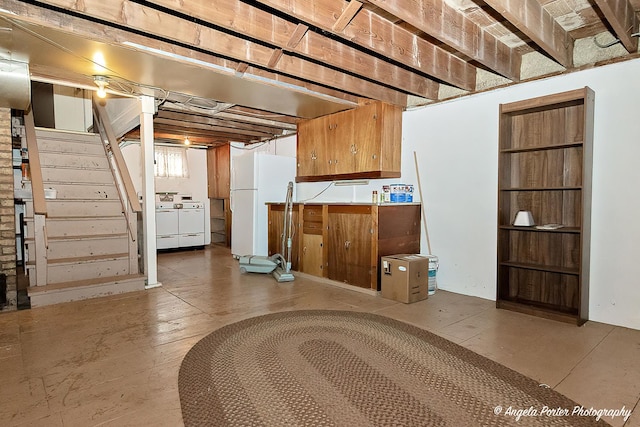 2618 Kashmiri Ave, Mchenry, IL 60050 - basement featuring freestanding refrigerator, washer and dryer, and stairway