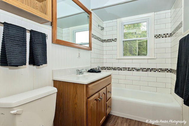 2618 Kashmiri Ave, Mchenry, IL 60050 - full bath featuring vanity, toilet, shower / tub combination, and wood finished floors