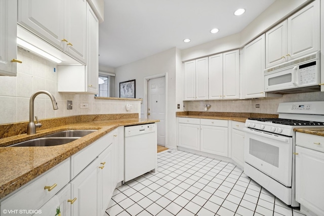 3047 Lexington Ln, Glenview, IL 60026 - kitchen featuring white appliances, a sink, white cabinets, decorative backsplash, and recessed lighting