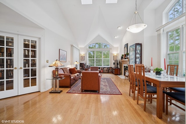 3047 Lexington Ln, Glenview, IL 60026 - living area with french doors, hardwood / wood-style floors, and high vaulted ceiling