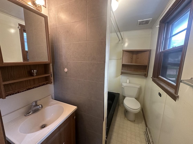 107 W S St, Morrison, IL 61270 - bathroom with toilet, vanity, tile patterned floors, and healthy amount of natural light