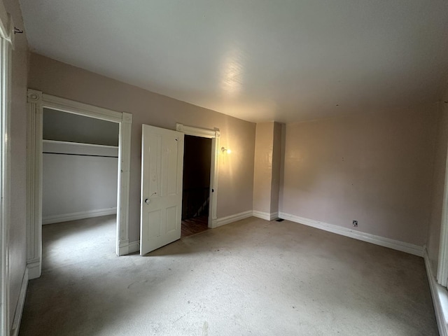 107 W S St, Morrison, IL 61270 - unfurnished bedroom with carpet, baseboards, and a closet