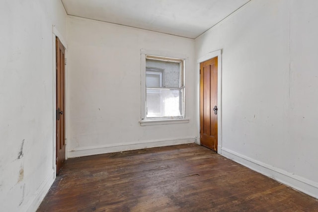 7703 S Loomis Blvd, Chicago, IL 60620 - unfurnished room featuring wood finished floors and baseboards
