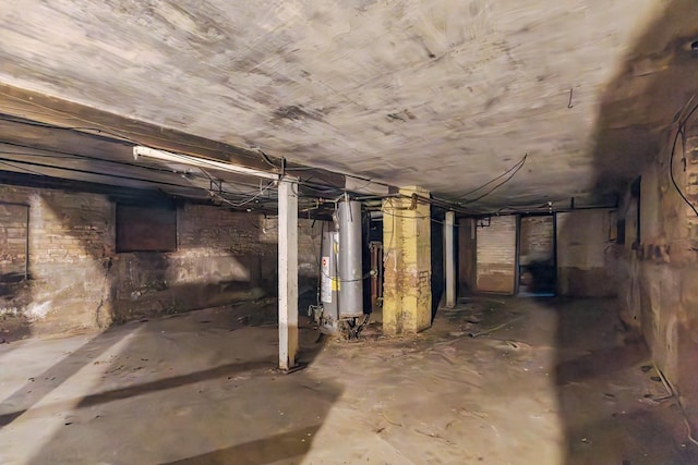 7703 S Loomis Blvd, Chicago, IL 60620 - unfinished basement featuring gas water heater