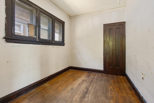 7703 S Loomis Blvd, Chicago, IL 60620 - unfurnished room featuring hardwood / wood-style flooring and baseboards
