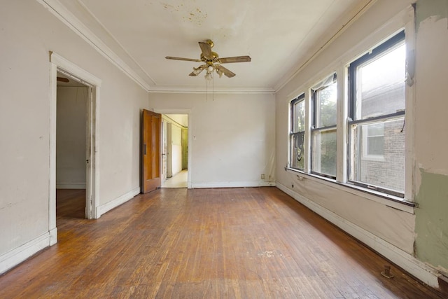 7703 S Loomis Blvd, Chicago, IL 60620 - spare room featuring hardwood / wood-style flooring, ceiling fan, ornamental molding, and baseboards