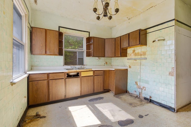 7703 S Loomis Blvd, Chicago, IL 60620 - kitchen with open shelves and brown cabinets