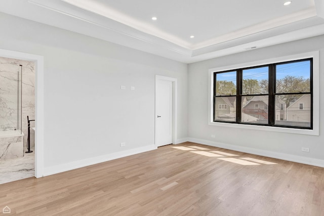 3905 N Drake Ave, Chicago, IL 60618 - empty room with light wood-type flooring, a raised ceiling, baseboards, and recessed lighting