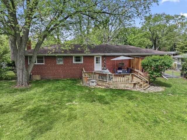 2N439 Bernice Ave, Glen Ellyn, IL 60137 - back of property with a wooden deck, brick siding, and a lawn
