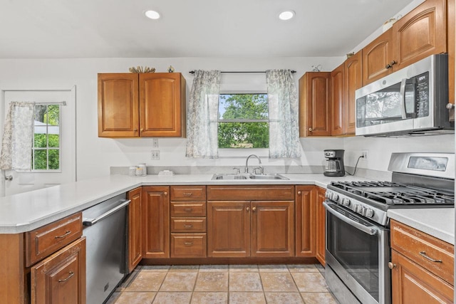 2N439 Bernice Ave, Glen Ellyn, IL 60137 - kitchen featuring stainless steel appliances, a sink, plenty of natural light, light countertops, and recessed lighting