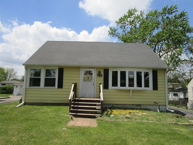 786 N Van Auken St, Elmhurst, IL 60126 - view of front of house featuring a front lawn and a shingled roof
