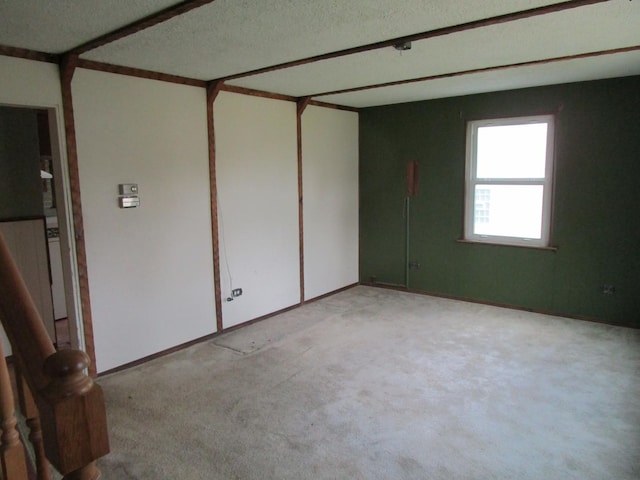 786 N Van Auken St, Elmhurst, IL 60126 - spare room with light carpet and a textured ceiling