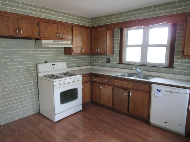 786 N Van Auken St, Elmhurst, IL 60126 - kitchen featuring white appliances, under cabinet range hood, a sink, brown cabinets, and light countertops