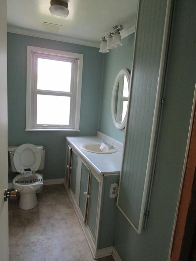 786 N Van Auken St, Elmhurst, IL 60126 - half bathroom with toilet, ornamental molding, and vanity