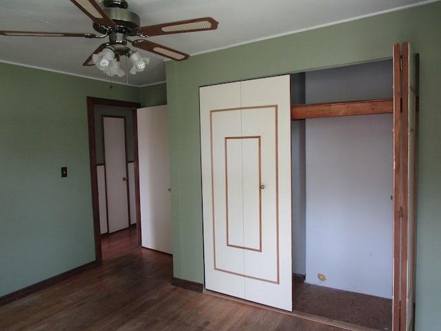 786 N Van Auken St, Elmhurst, IL 60126 - unfurnished bedroom with dark wood finished floors, a closet, and a ceiling fan