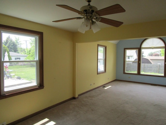 786 N Van Auken St, Elmhurst, IL 60126 - spare room with light carpet, baseboards, and ceiling fan